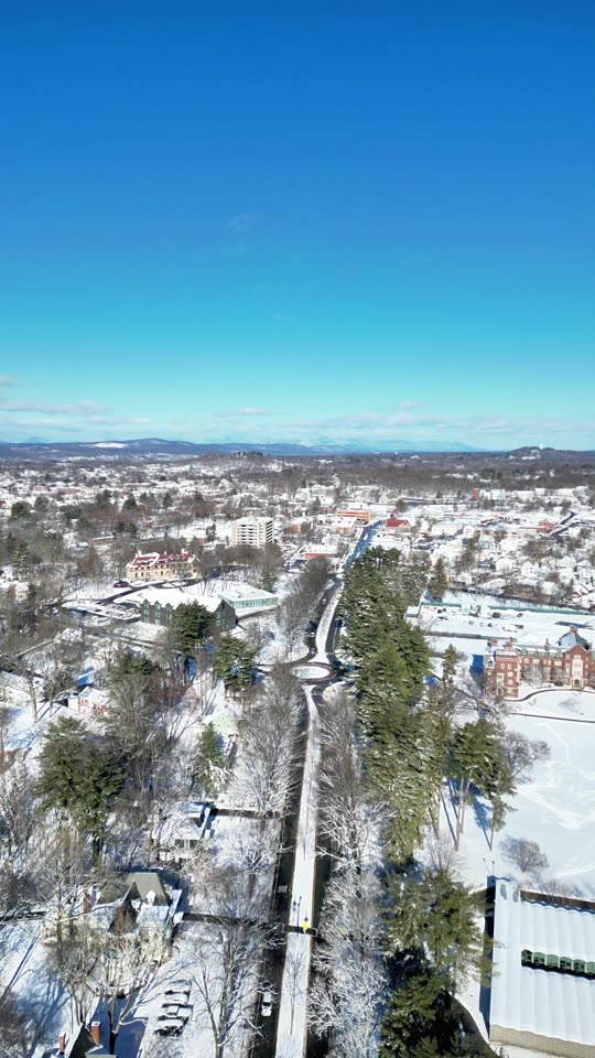 Descending over Arlington in winter (vert)