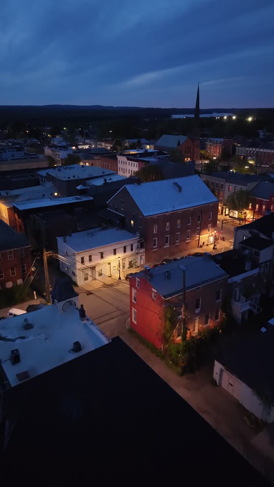 Flying over Warren Street in Hudson at night