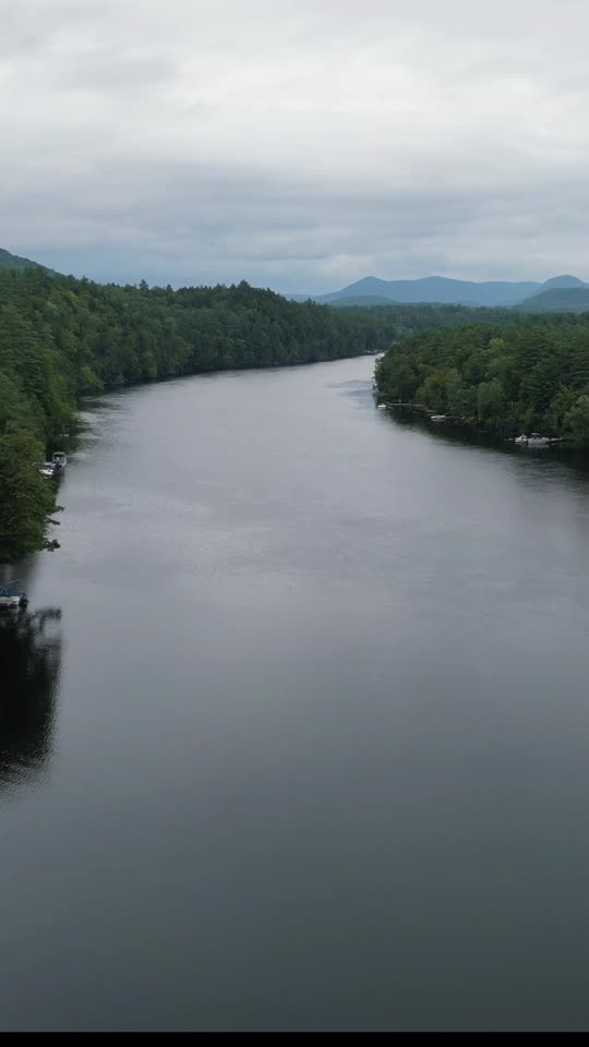 Flying over the river towards the Adirondacks (vert)