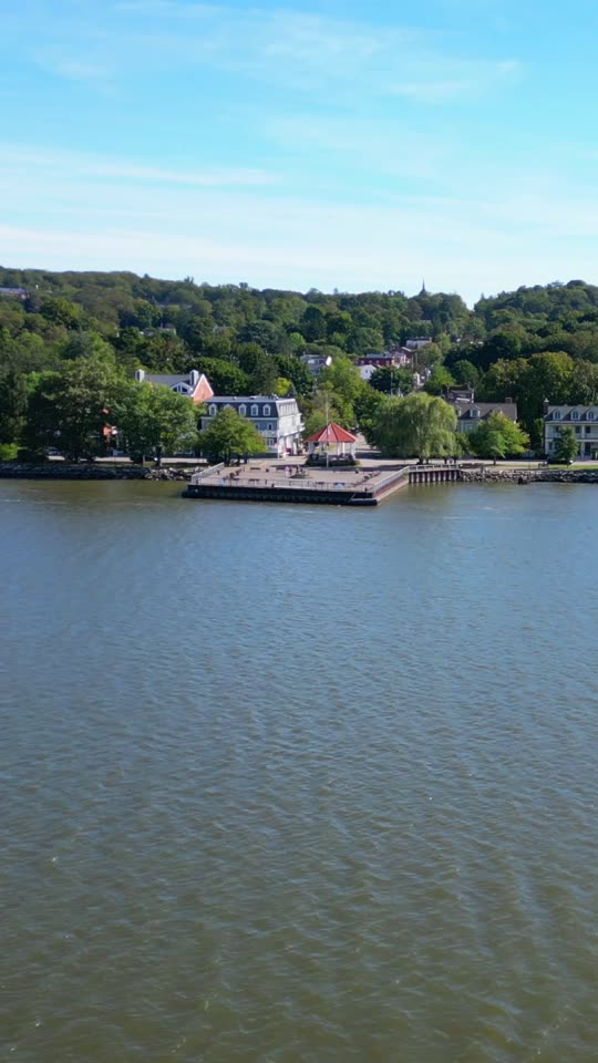 Flying parallel to the Cold Spring waterfront (vert)