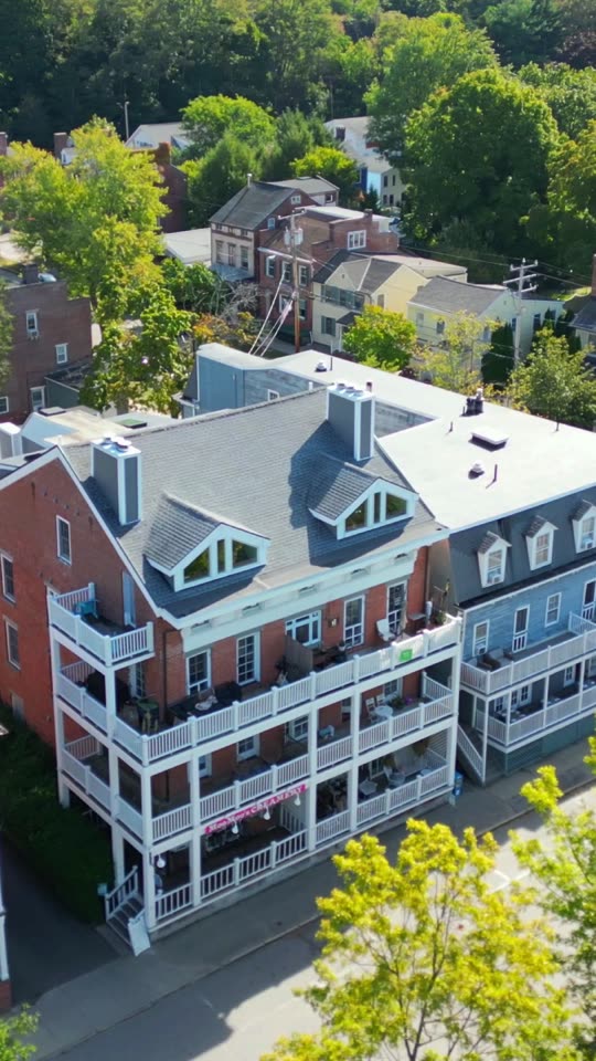 Flying parallel to the Cold Spring waterfront buildings (vert)