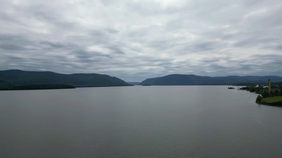 Flying towards Bannermans Castle from the Newburgh waterfront on an overcast day