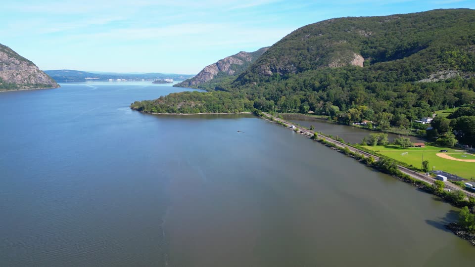 Flying towards the mountains from the river near Cold Spring