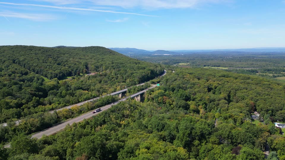 Flying towards two highway bridges