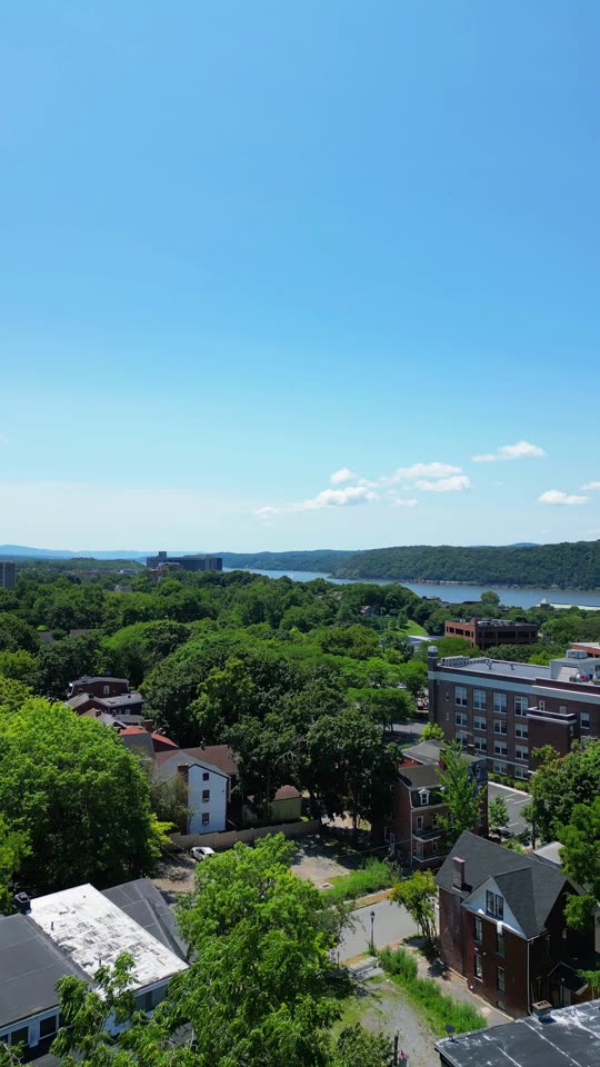 Lower downtown Poughkeepsie looking downriver and rising towards the bridges