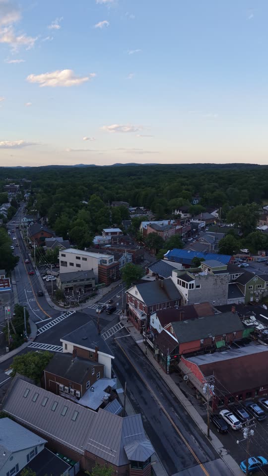 Orbit over New Paltz intersection towards the mountains evening