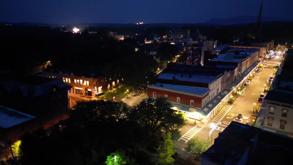 Orbit over uptown Kingston at night