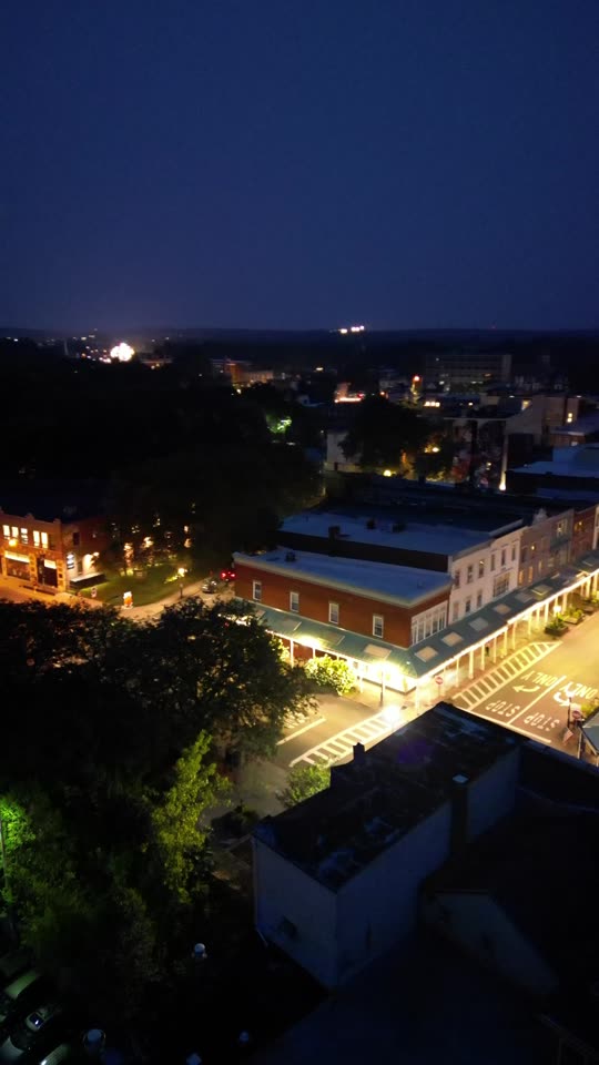 Orbit over uptown Kingston at night (vert)