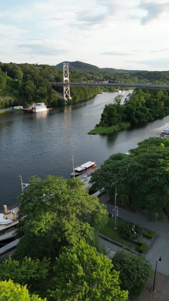 Panning down towards a boat on the Rondout (vert)