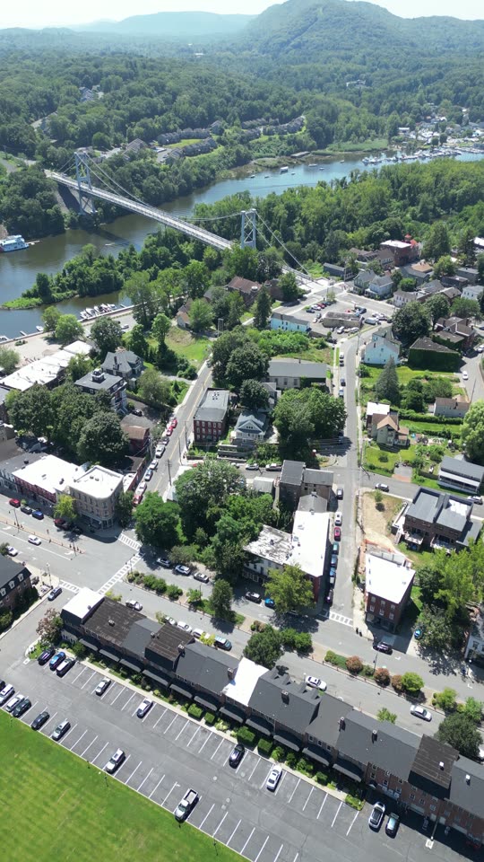Panning up high above the Rondout (vert)
