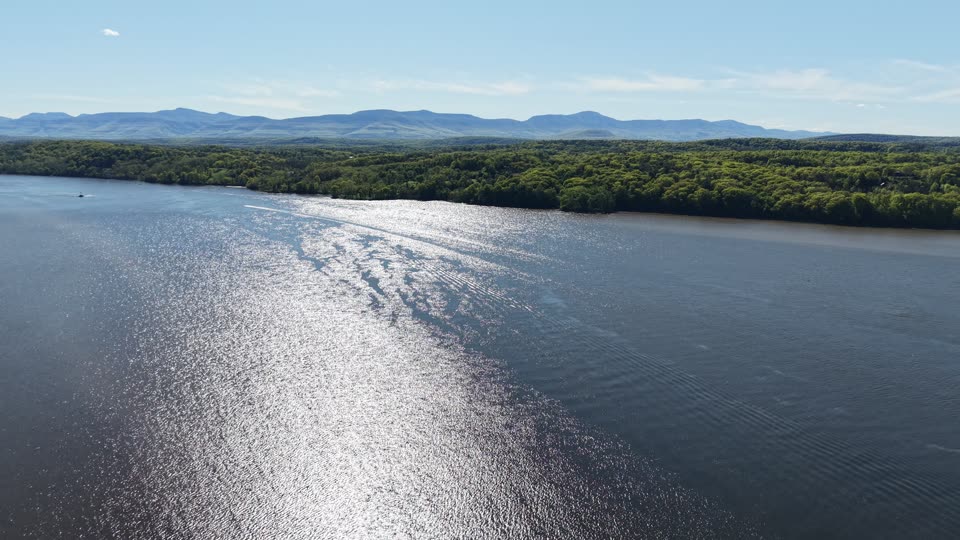 Pulling back over the Hudson River looking towards the Catskills near Hudson