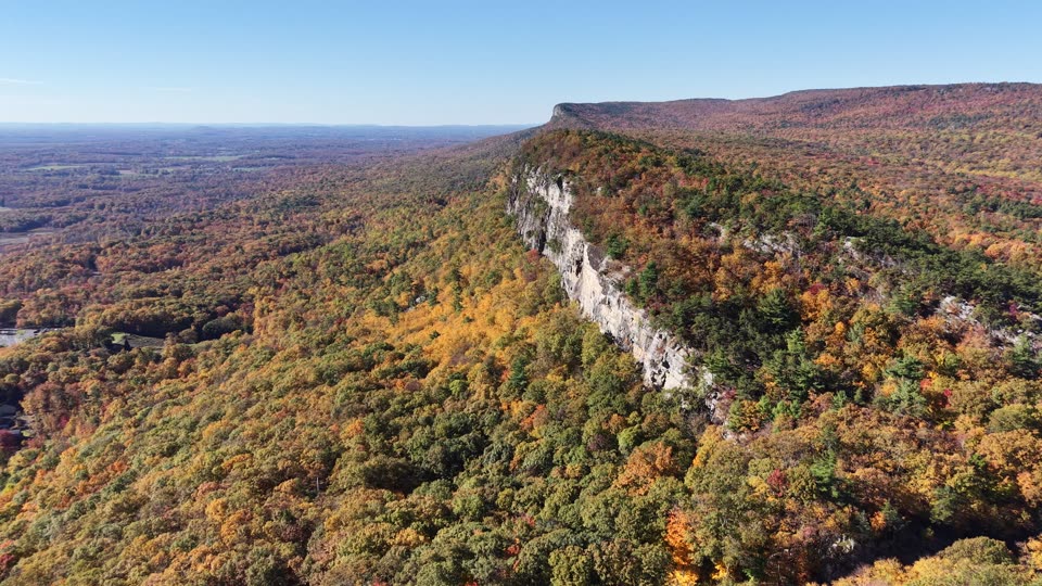 Flying alongside the ridge in fall