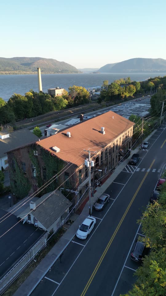 Rising above Newburgh Brewing towards the River