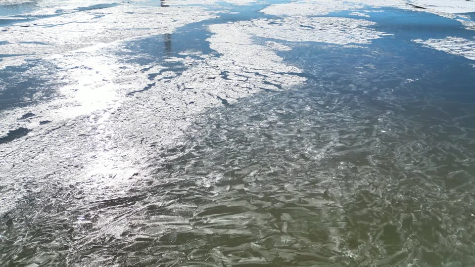 Swing up towards Mid-Hudson Bridge over icy river